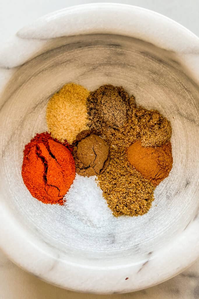 A closeup shot of a bowl of spices.