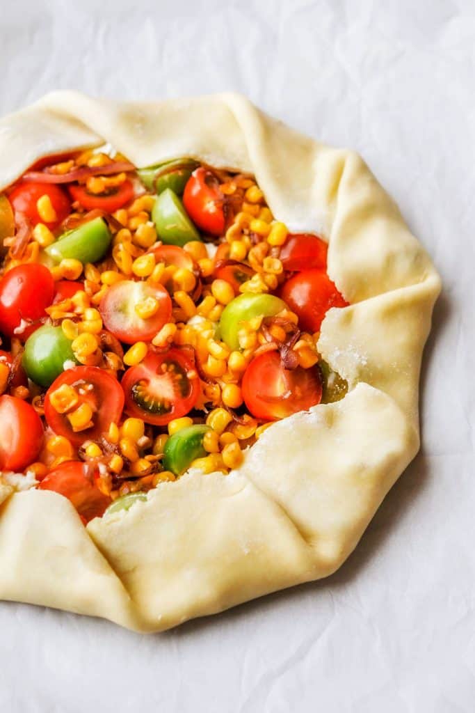 tomato galette with uncooked dough