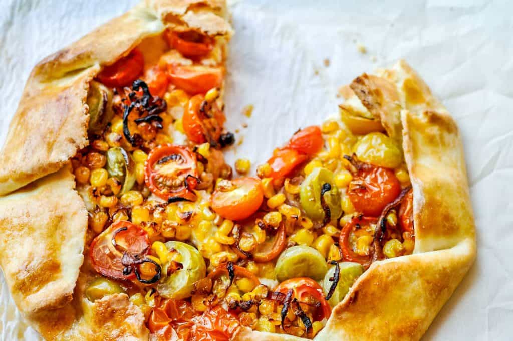 tomato galette with a piece cut out