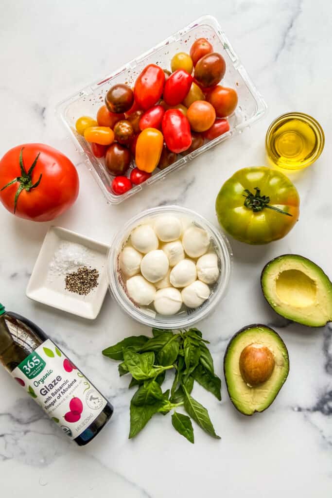 Ingredients for an avocado caprese salad.
