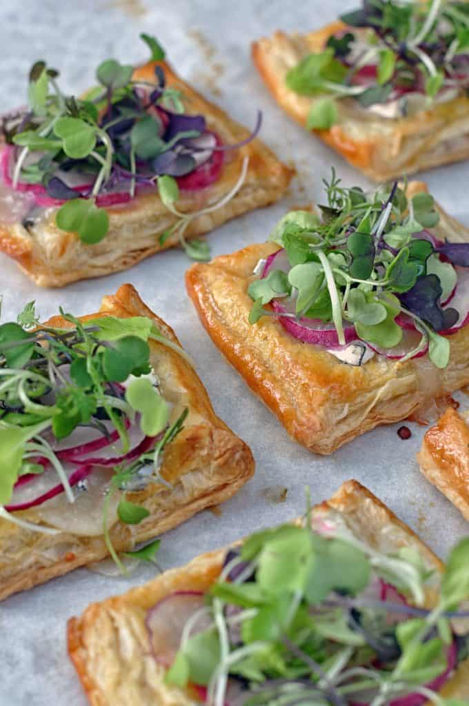 radish puff pastry appetizers on parchment paper