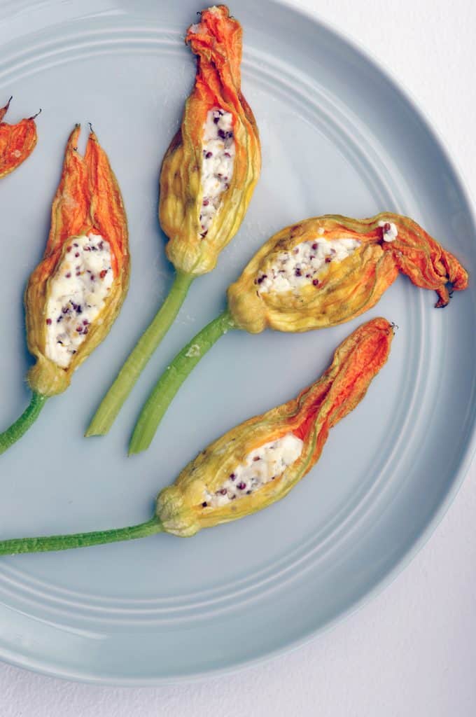 stuffed squash blossoms on a plate