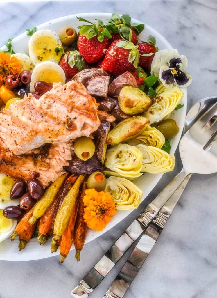 Salmon Salad Niçoise on platter with utensils