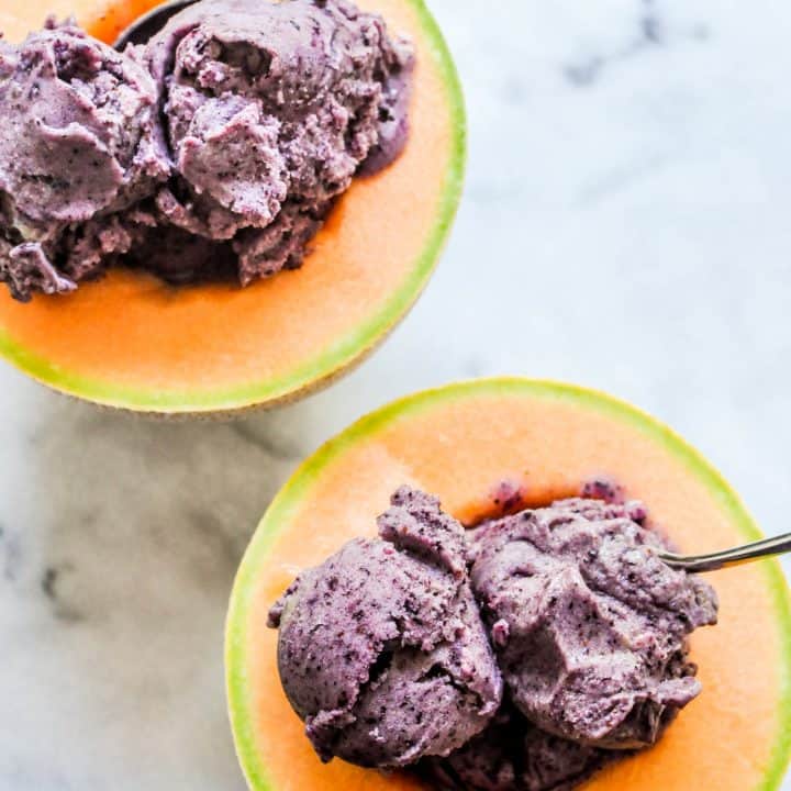 vegan blueberry ice cream in halved cantaloupes