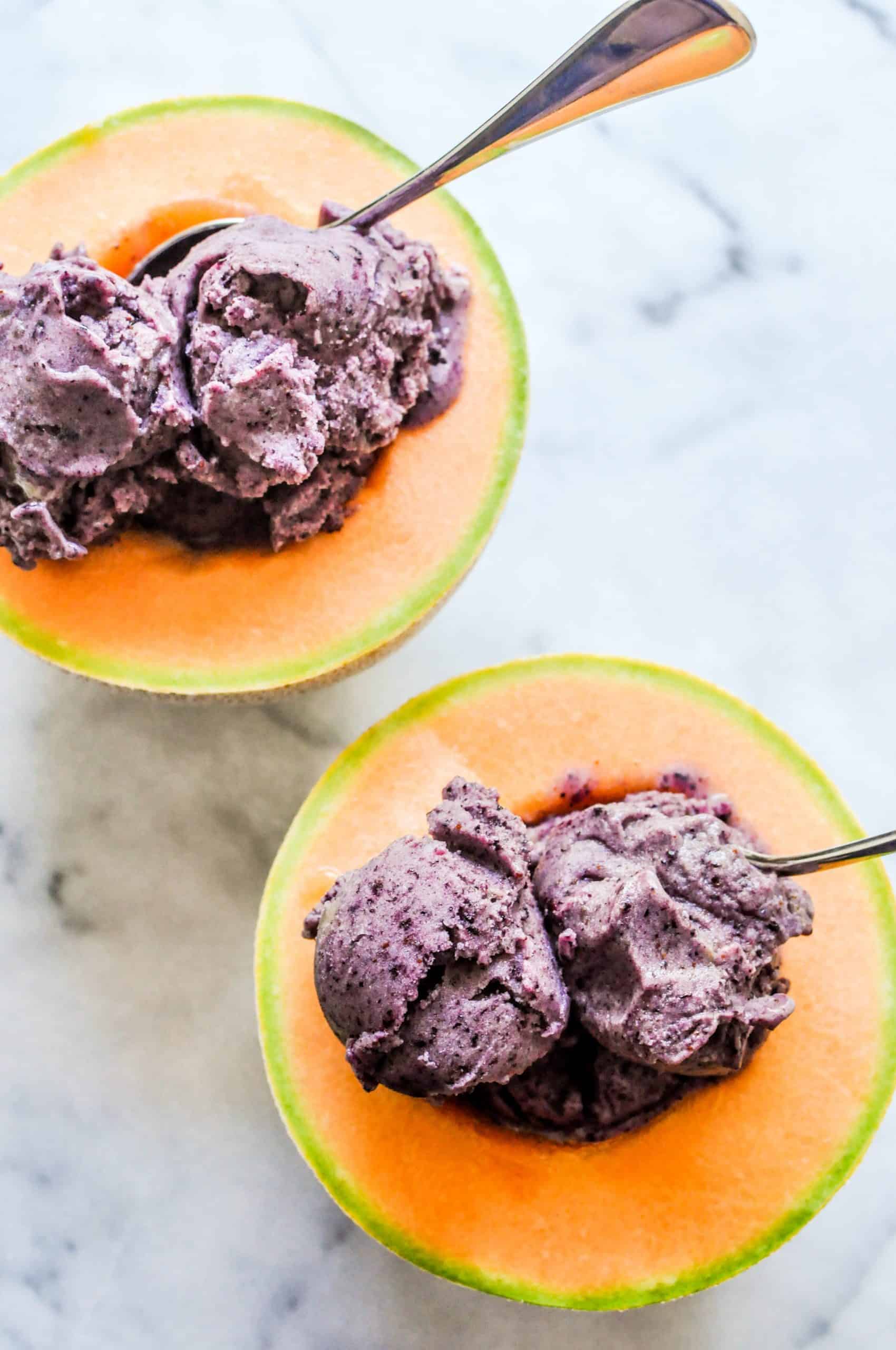 Vegan blueberry ice cream in halved cantaloupes.