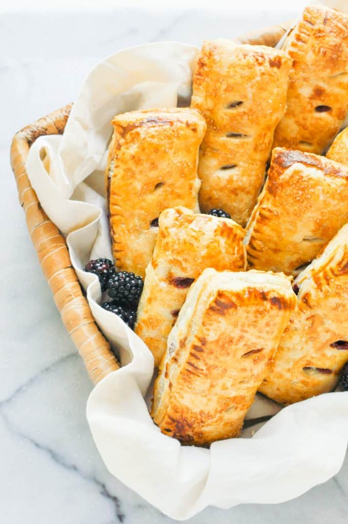 blackberry apple hand pies in a basket