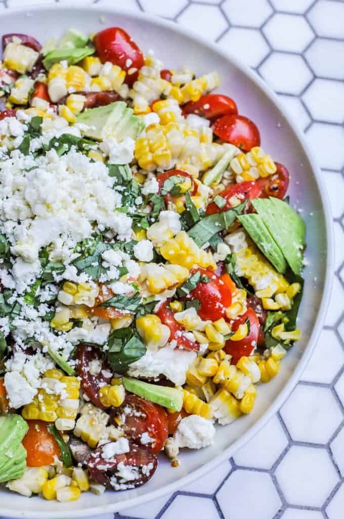 grilled corn salad in a large serving bowl