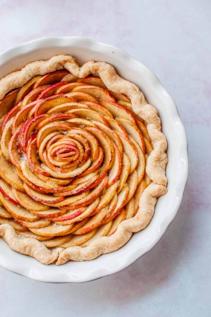 rose apple tart in a pie pan
