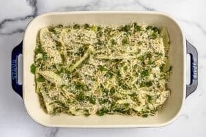 Fennel, breadcrumbs, and parmesan in a baking dish.