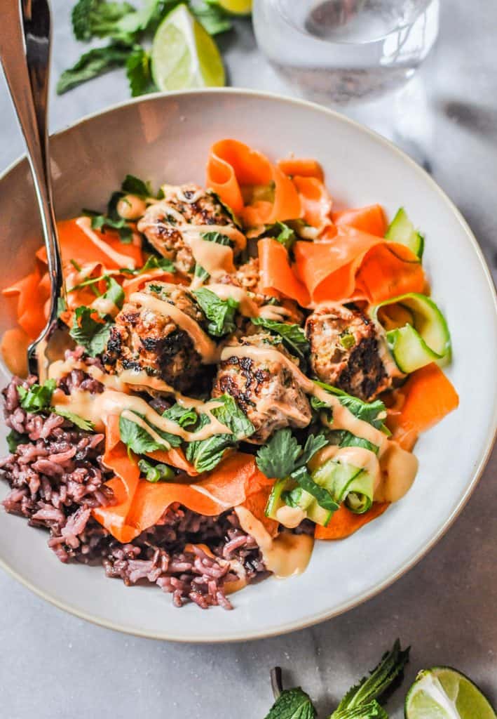 bowl of turkey banh mi meatballs with rice