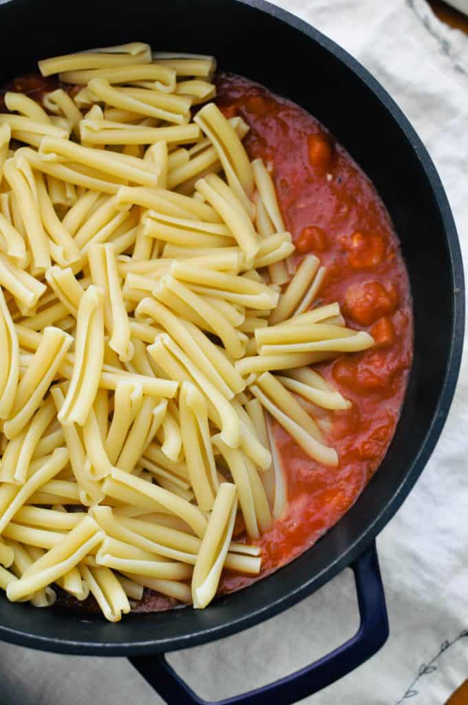 pasta and tomato sauce in a pot