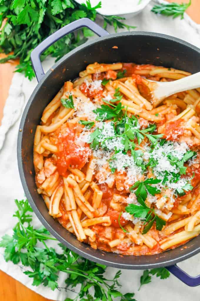 Tomato pasta in a blue pot.