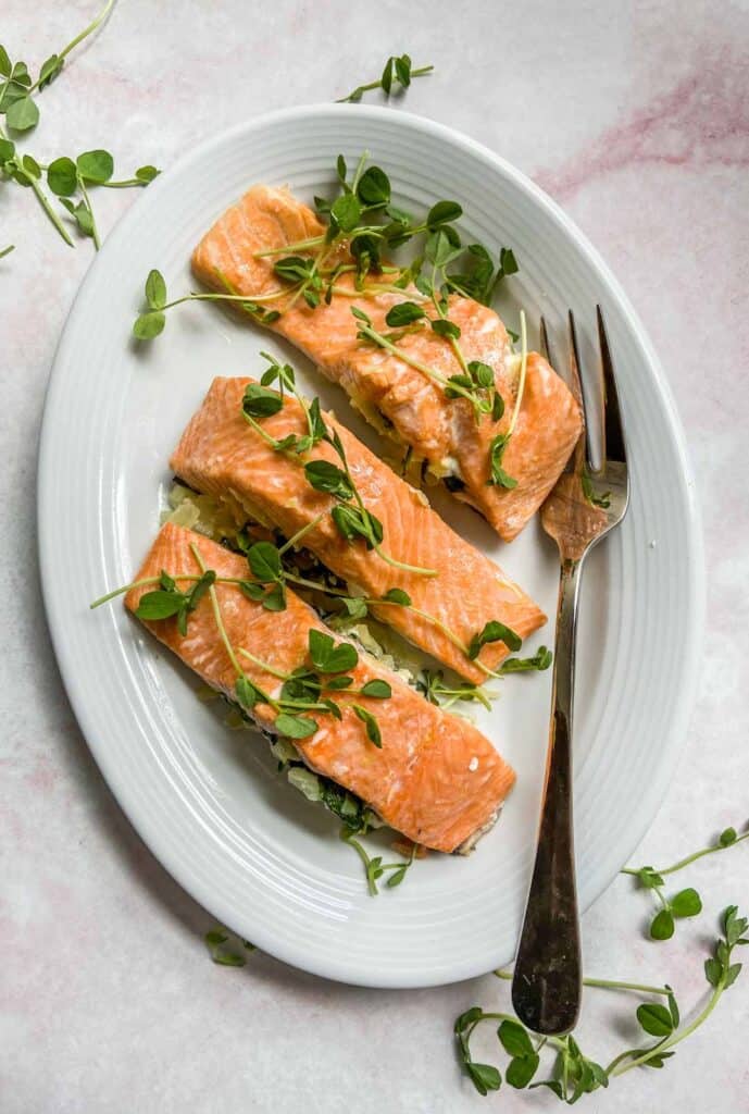 spinach stuffed salmon on a plate