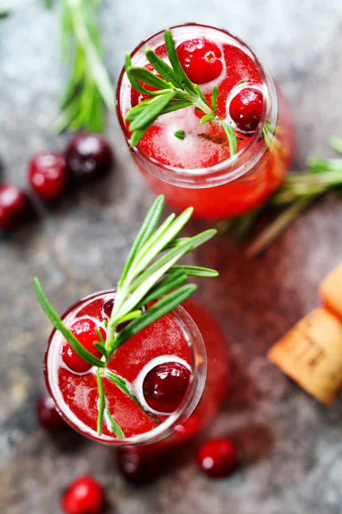 Cranberry ginger bellinis in two glasses.