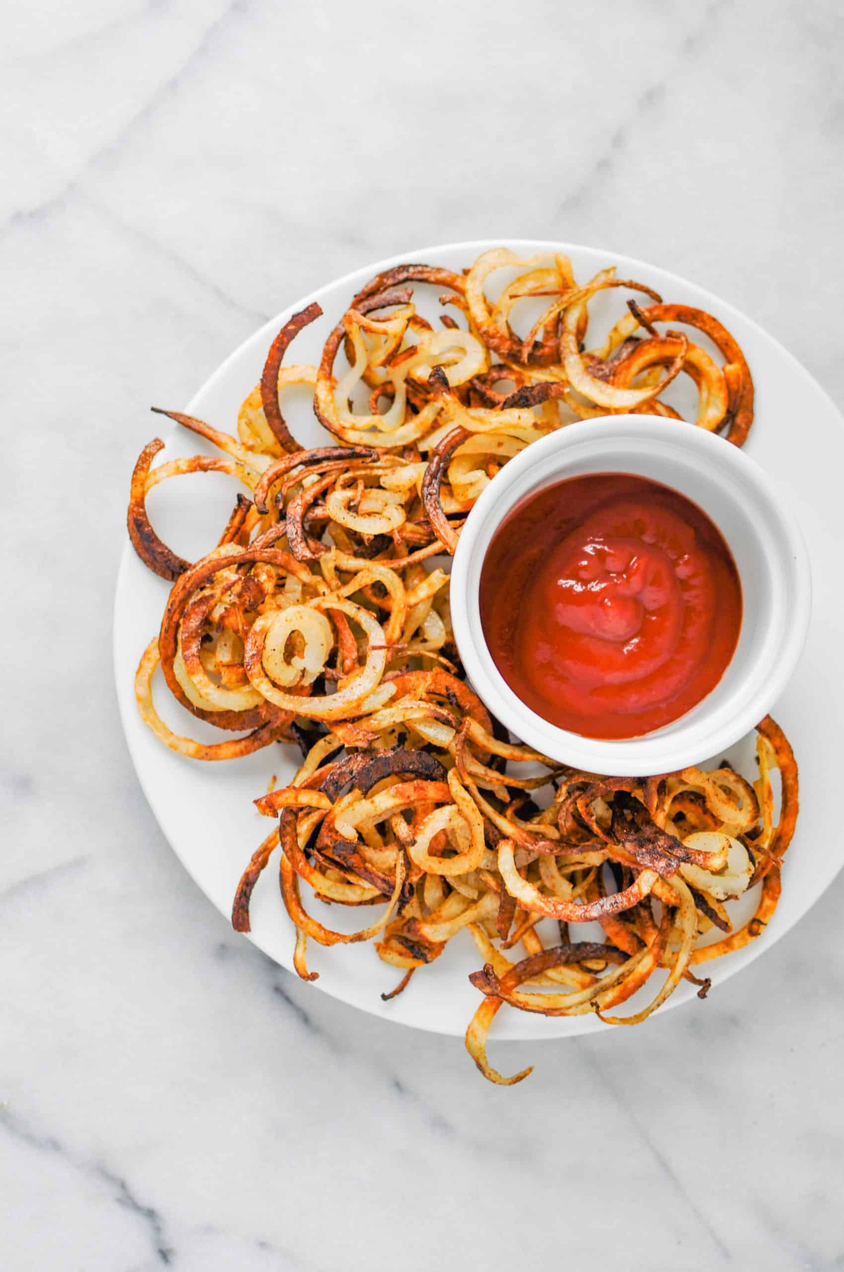 baked curly fries with ketchup