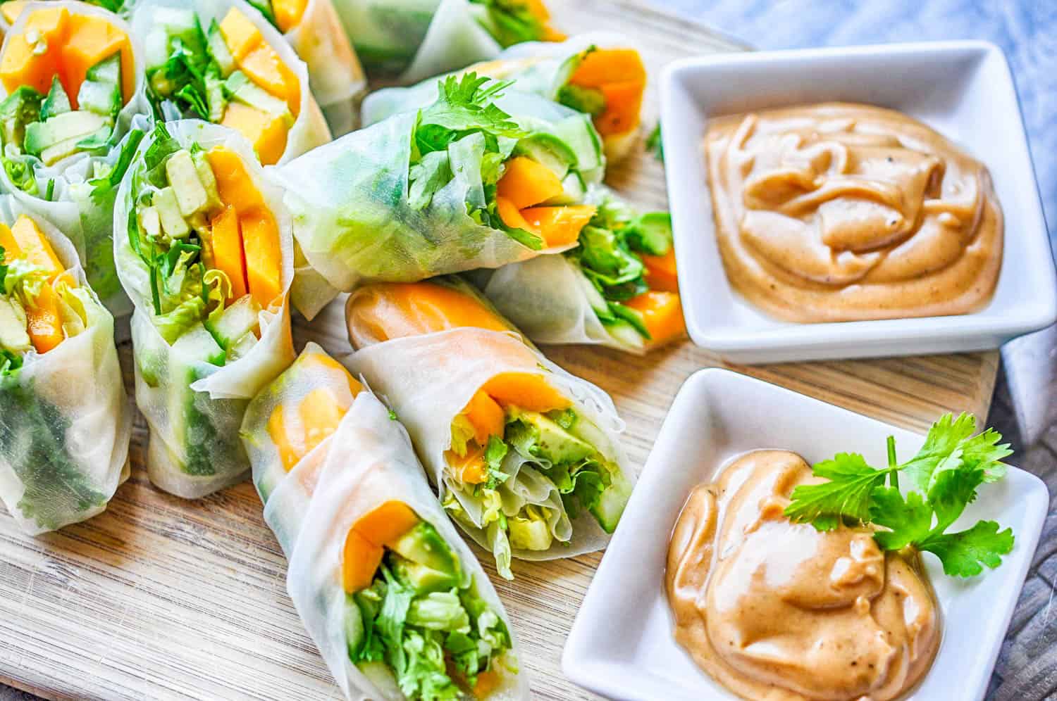 tropical vegan summer rolls with a peanut dipping sauce