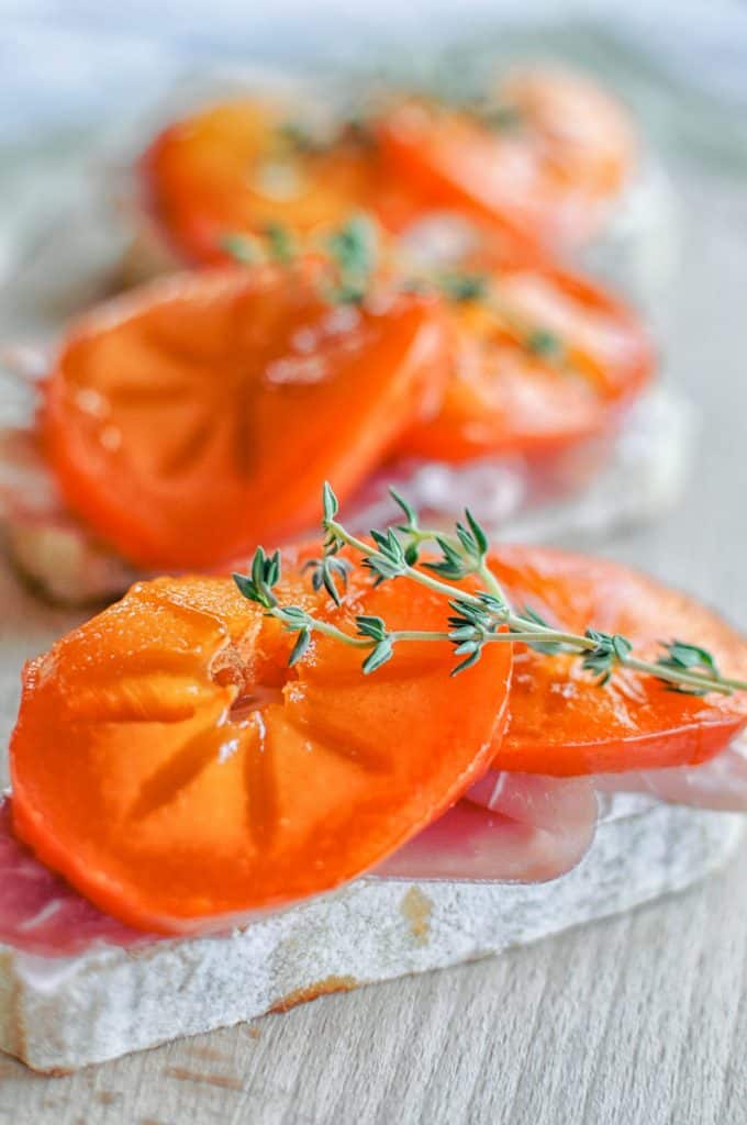 persimmon and prosciutto on a crostini