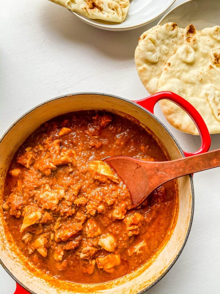 berbere spiced chicken in a pot