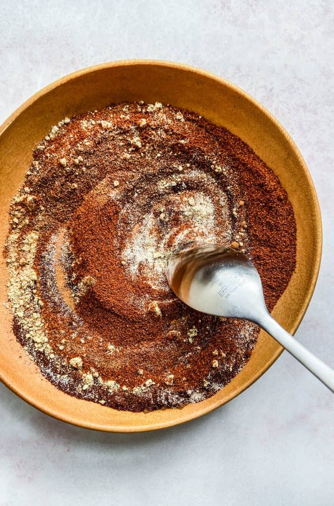 berbere spice blend on a wooden plate