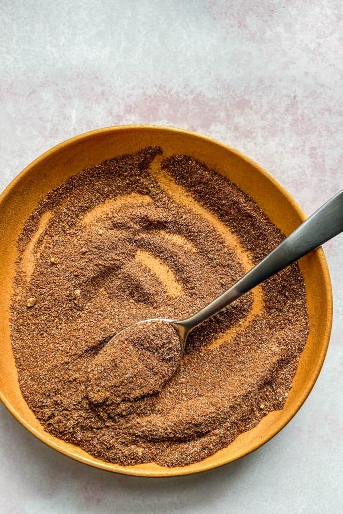 berbere spice blend on a wooden plate