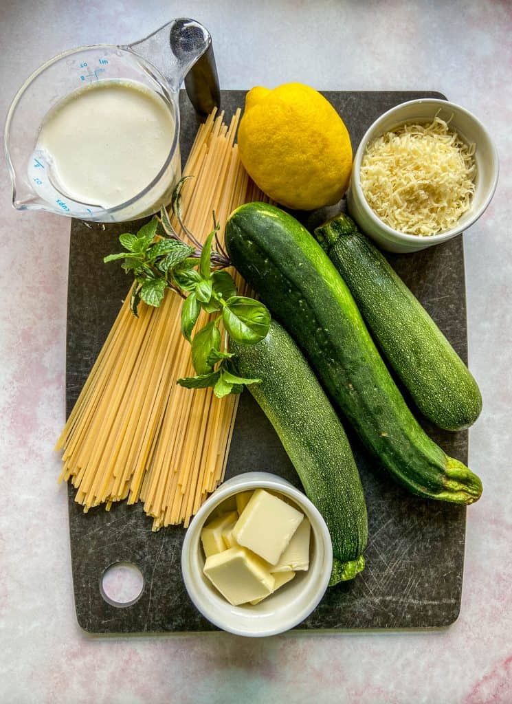 zucchini pasta ingredients on a cutting board
