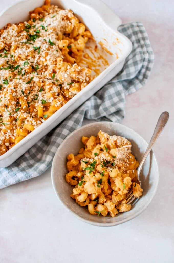 Cauliflower mac and cheese in a pan and bowl.