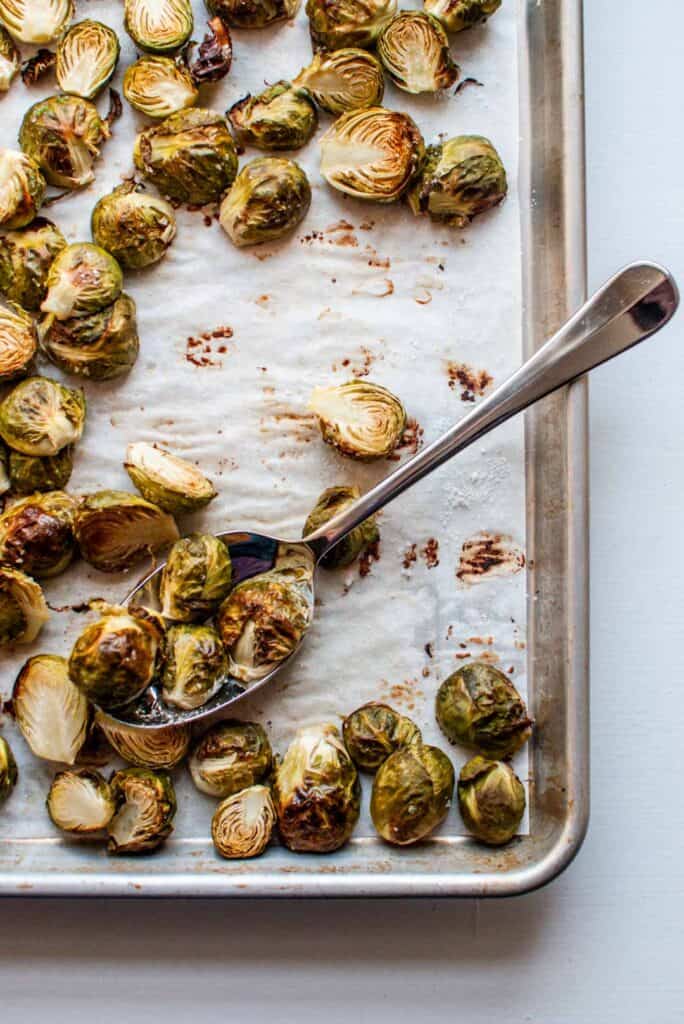 roasted brussels sprouts on a baking sheet