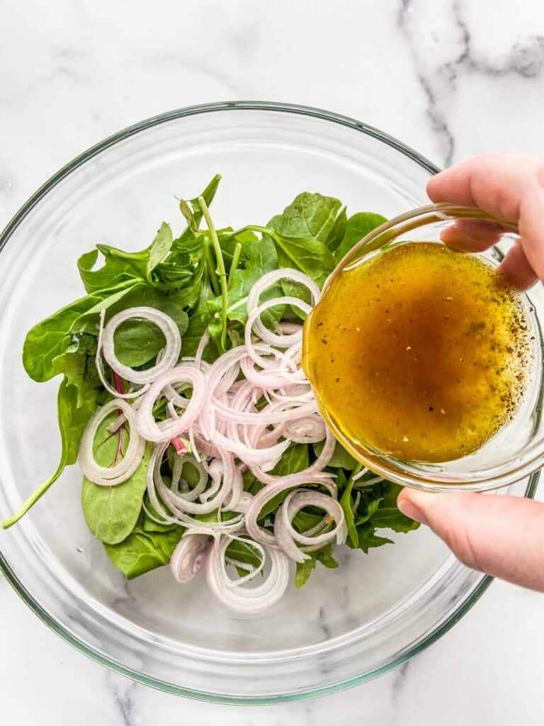 dressing the greens and the chopped shallots