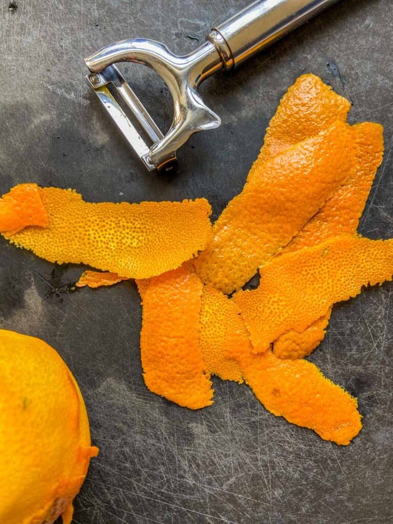 slices of orange peels on a cutting board