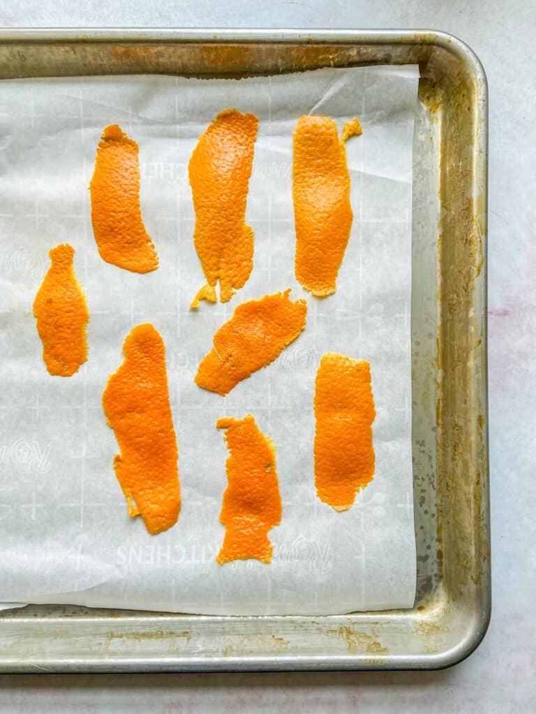 orange peels on a baking sheet