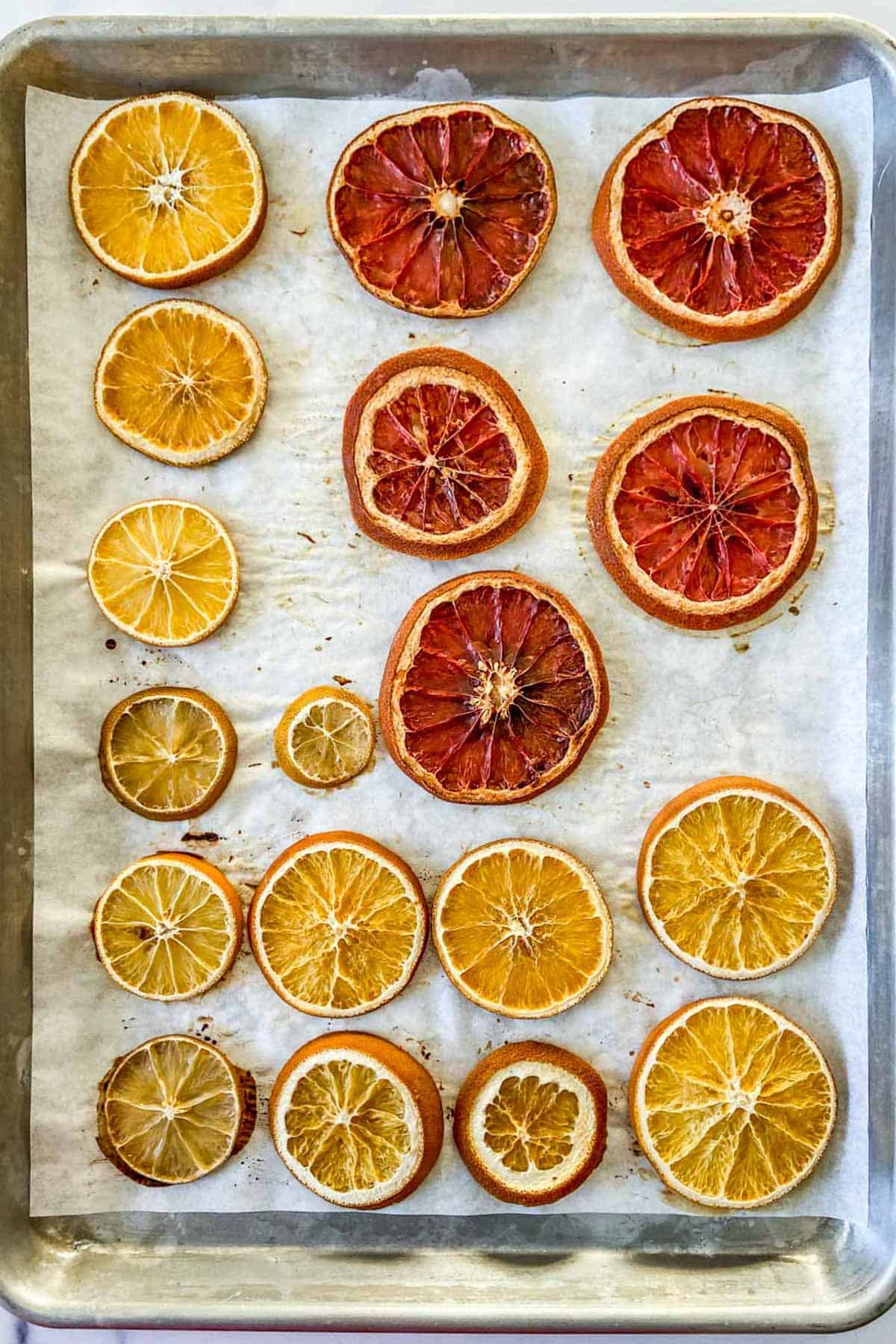 Orange and citrus slices after drying in the oven.