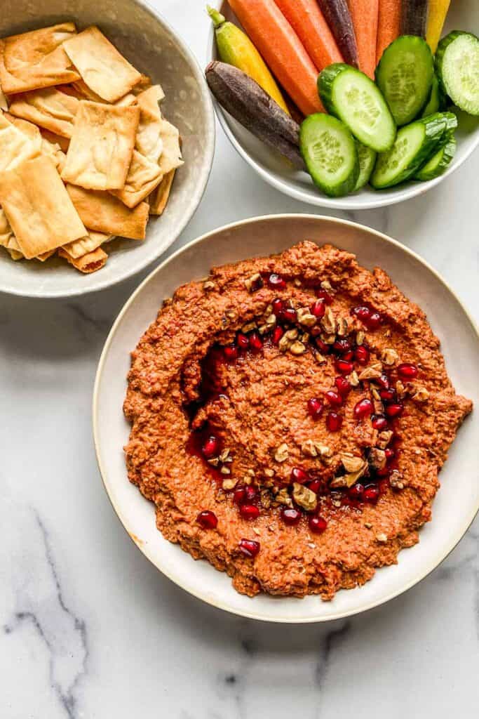 muhammara dip with pita chips and fresh vegetables