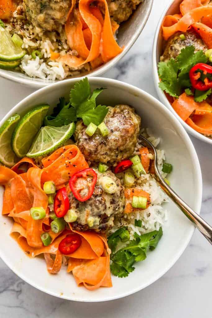 Healthy ground beef meatballs with Thai green curry in a bowl. 