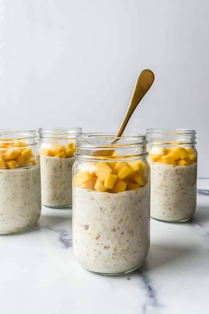 https://thishealthytable.com/wp-content/uploads/2021/01/mango-lassi-overnight-oats-5-of-7-683x1024.jpg