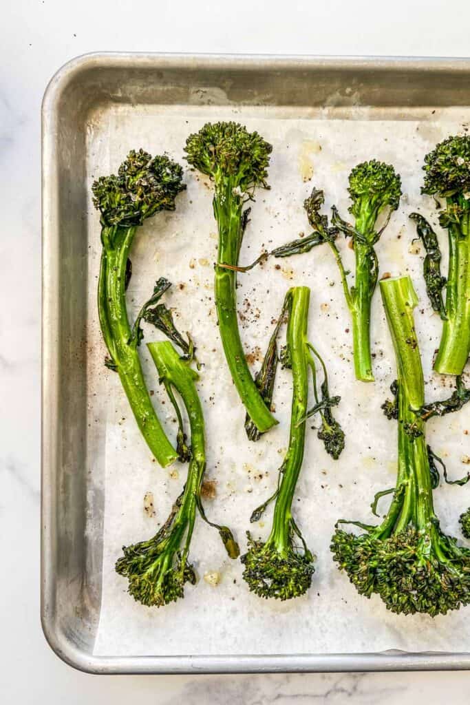 roasted broccolini on a baking sheet