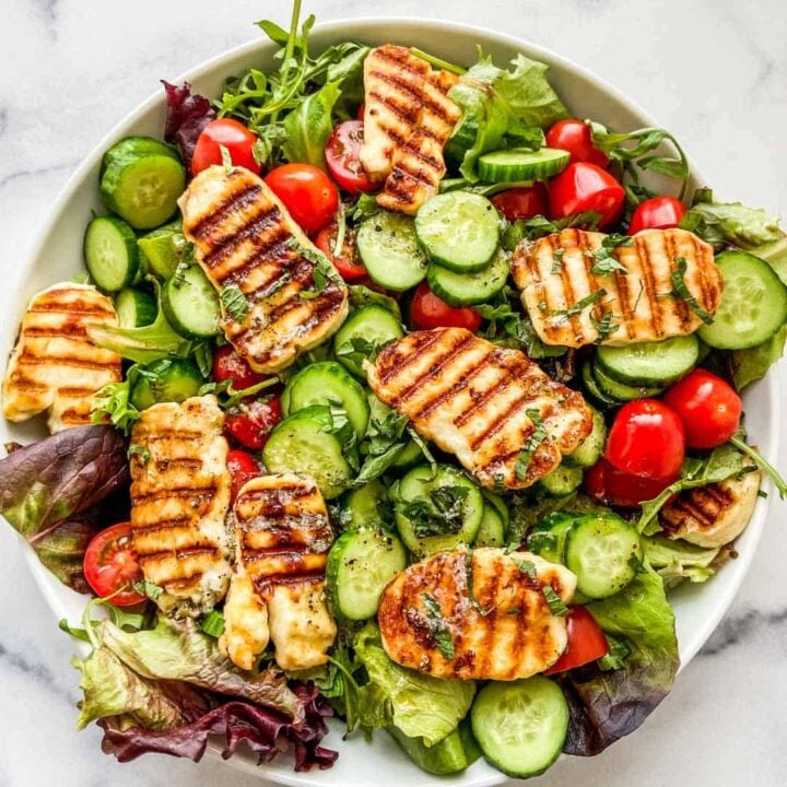 Overhead shot of grilled halloumi salad.