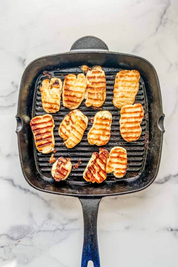 Grilled halloumi in a grill pan.