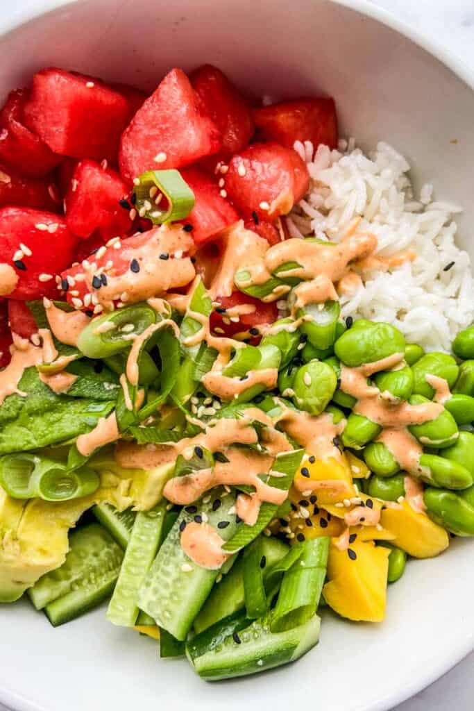 A closeup shot of a bowl of watermelon poke.