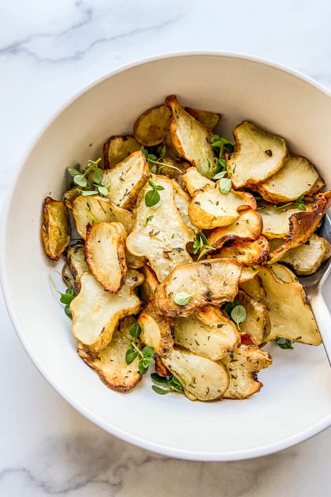 A bowl of roasted sunchokes.