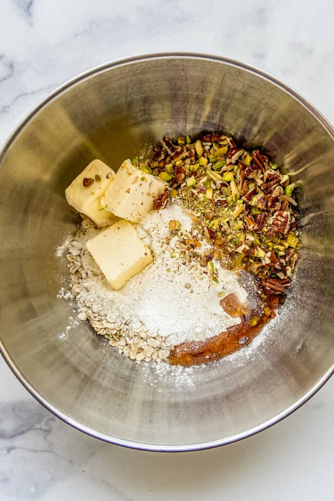 Ingredients for the crisp topping in a metal bowl.