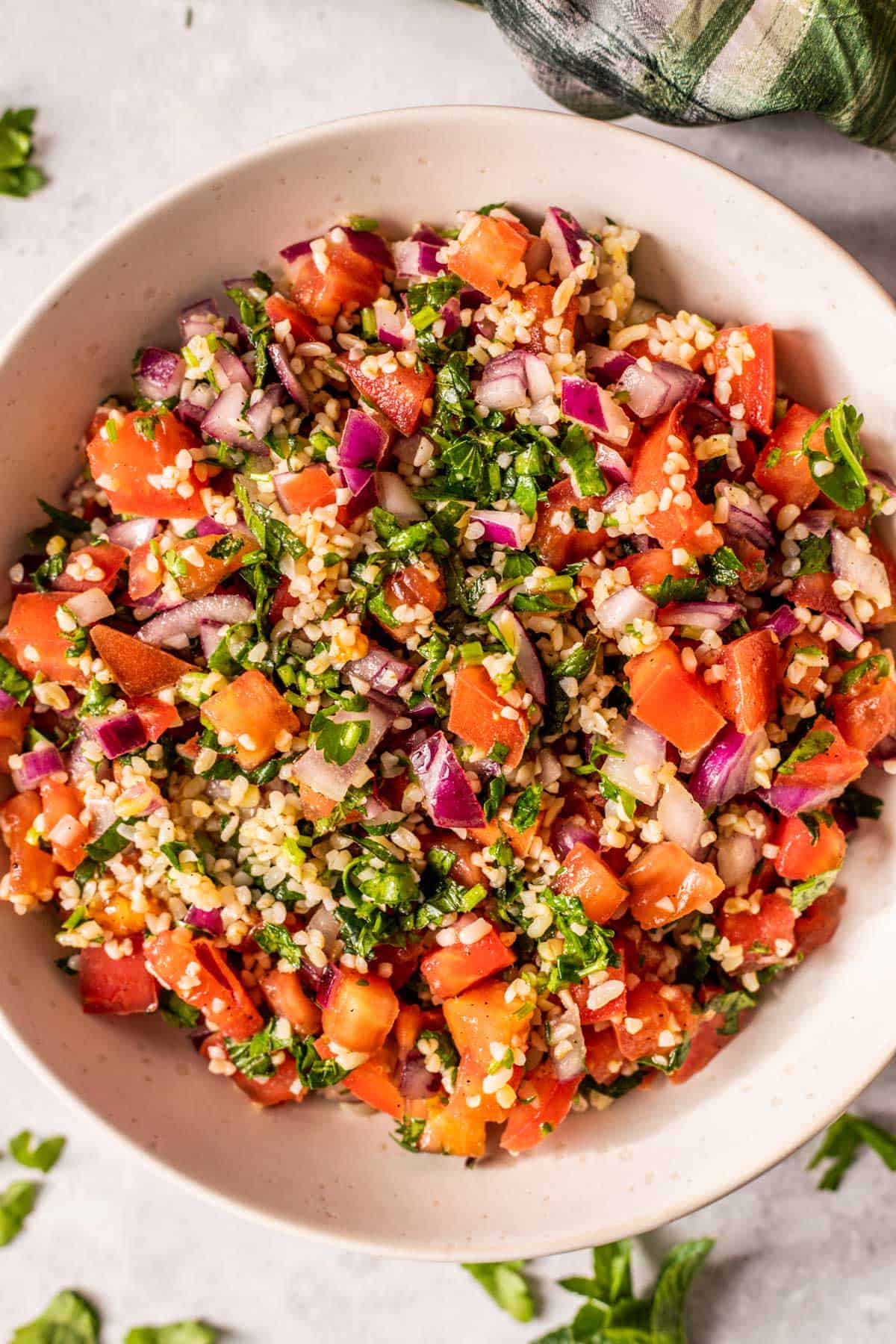 Authentic Lebanese tabouli salad in a white bowl.