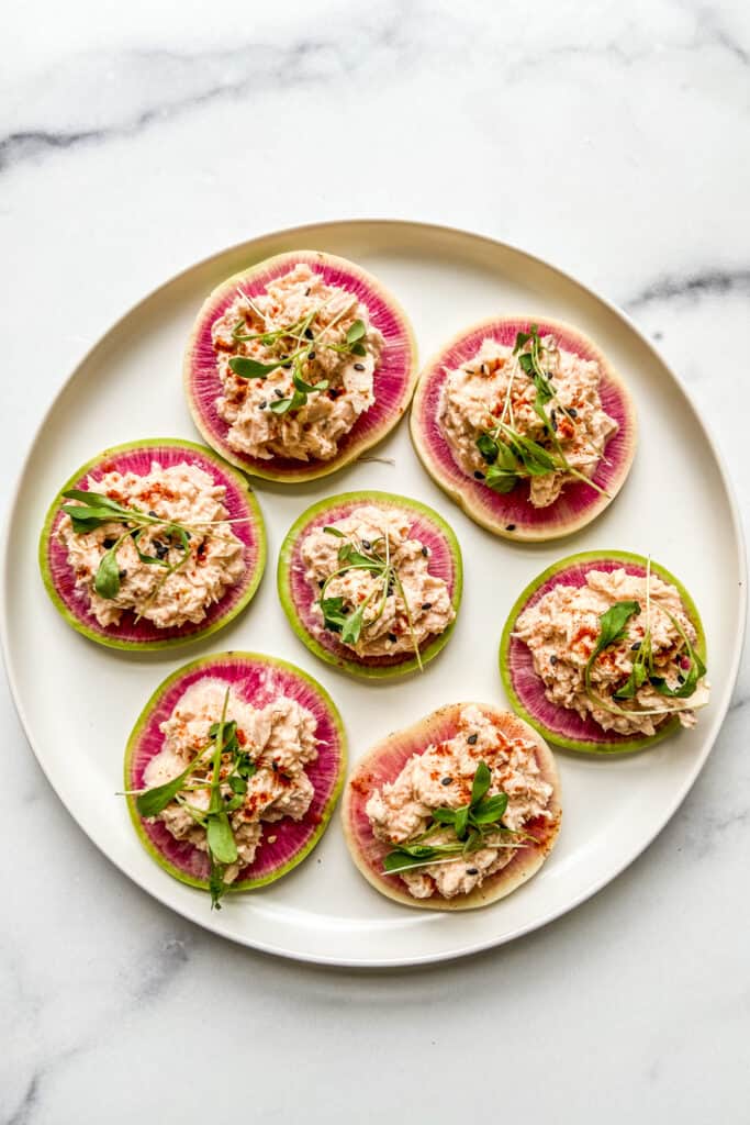 A plate of watermelon radish appetizer bites.