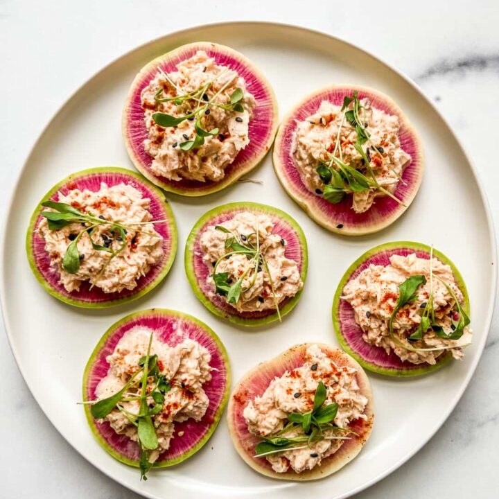 A plate of watermelon radish appetizer bites.