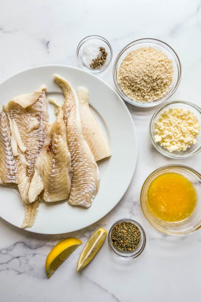 Haddock fillets, panko breadcrumbs, butter, cheese, Italian seasoning, salt, and pepper.