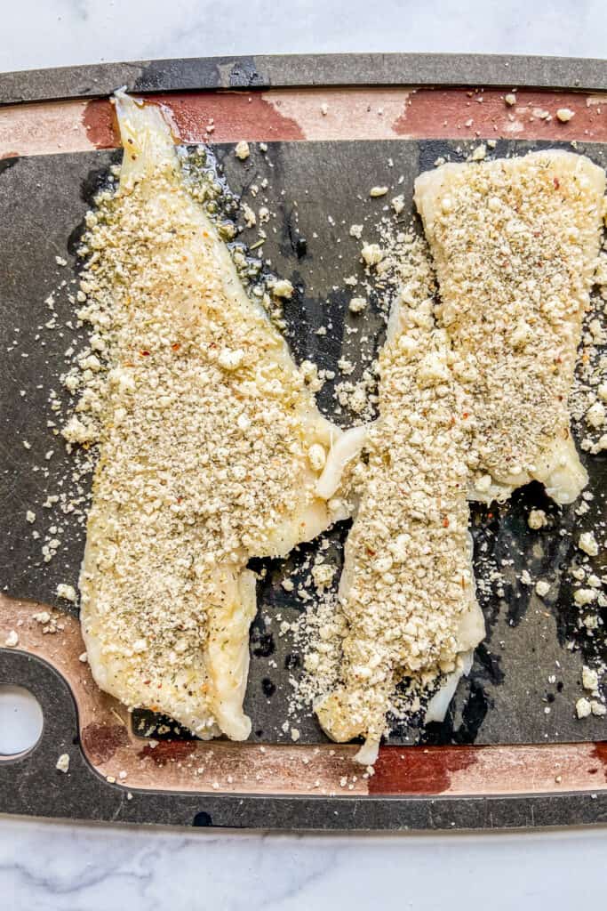 Haddock fillets covered in panko and cheese.