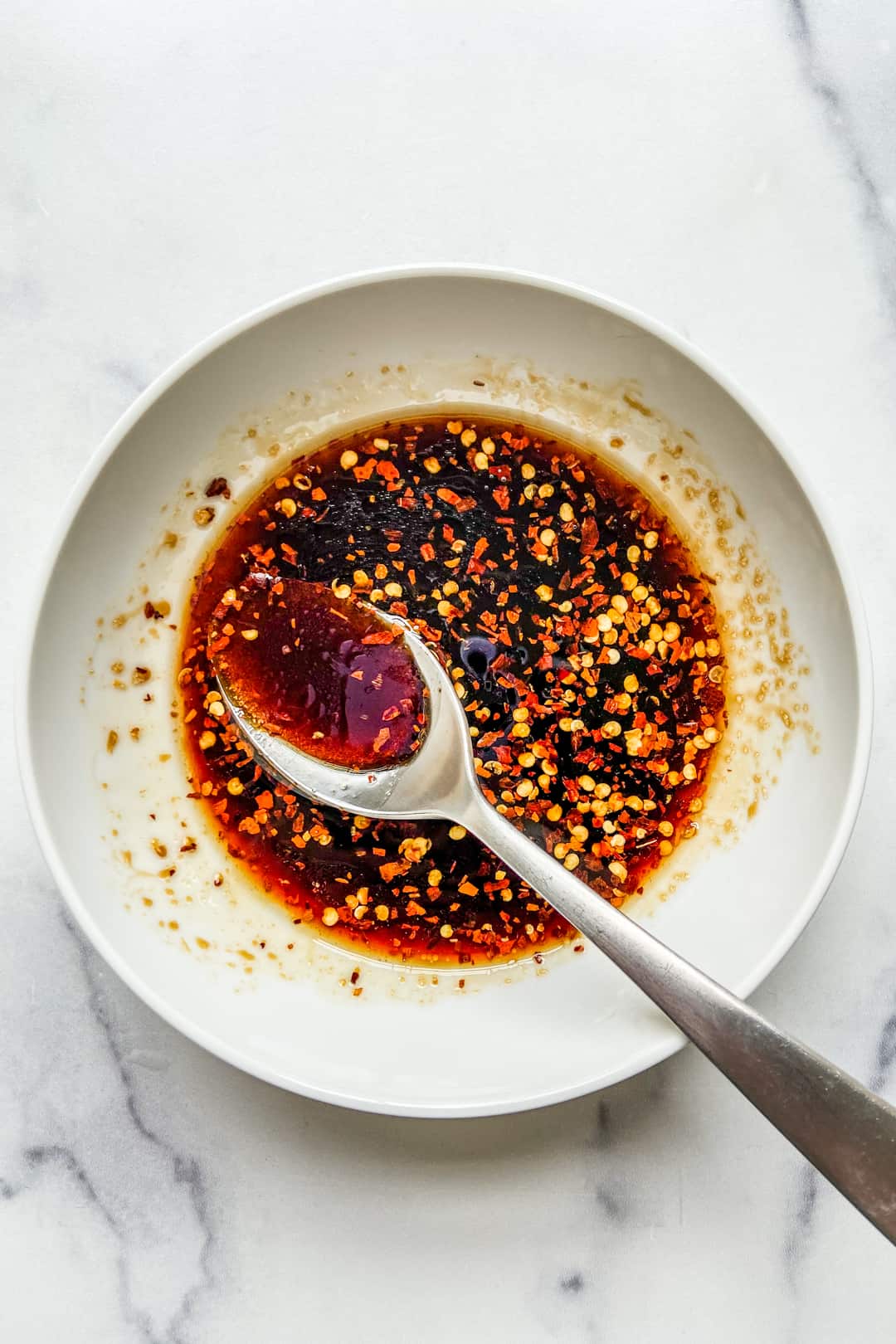 A savory bulgogi sauce in a white bowl.