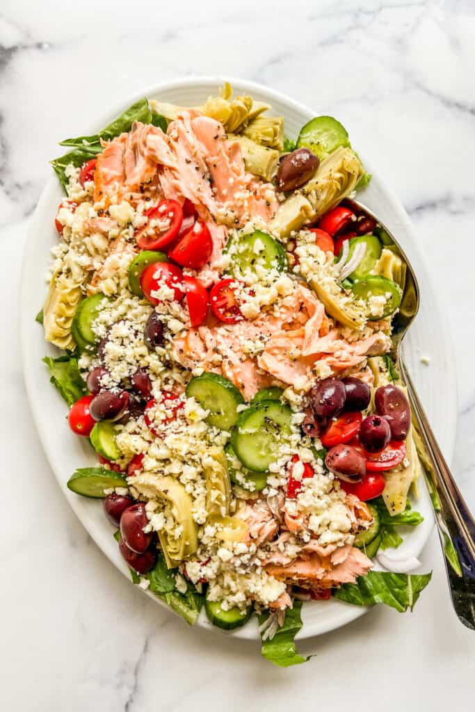 A large platter of salmon salad.