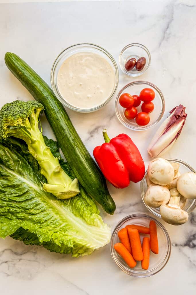 Lots of fresh vegetables on a marble background.