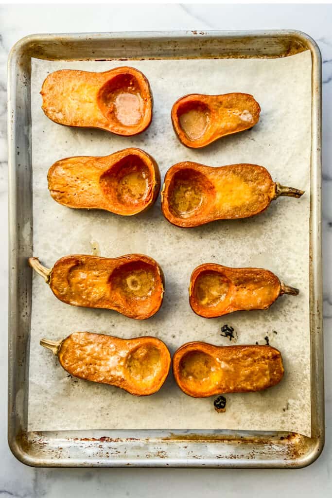 Roasted squash on a baking sheet.