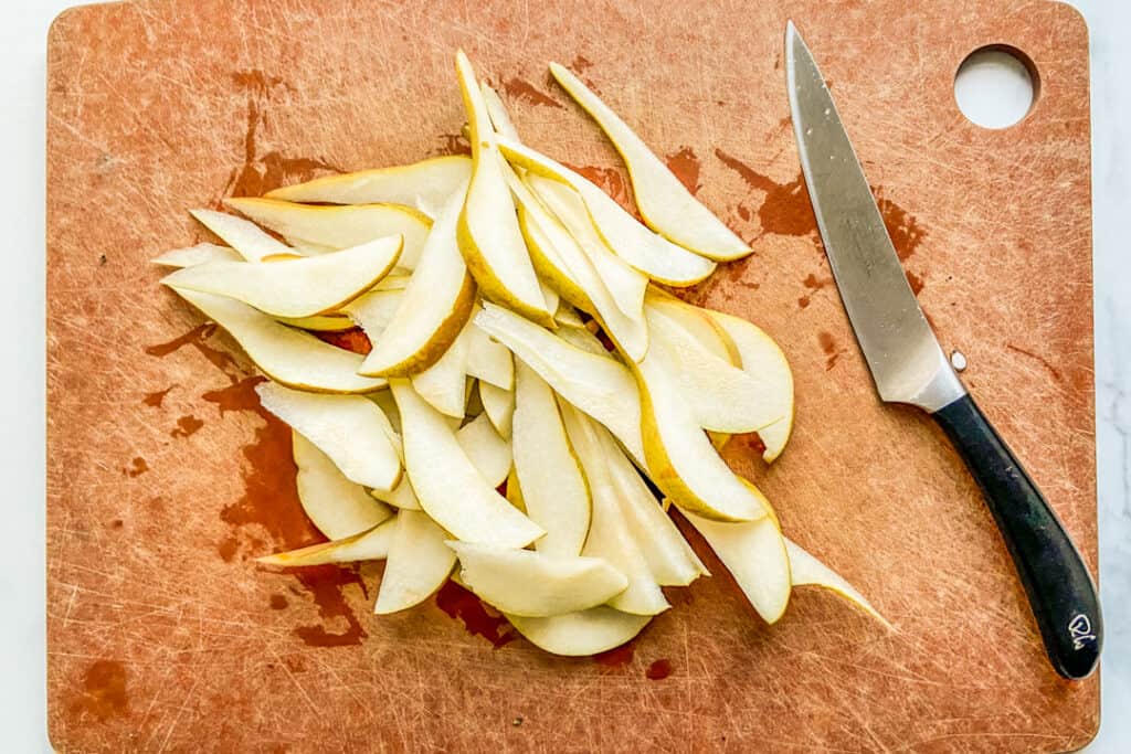 Chopped pears on a cutting board.